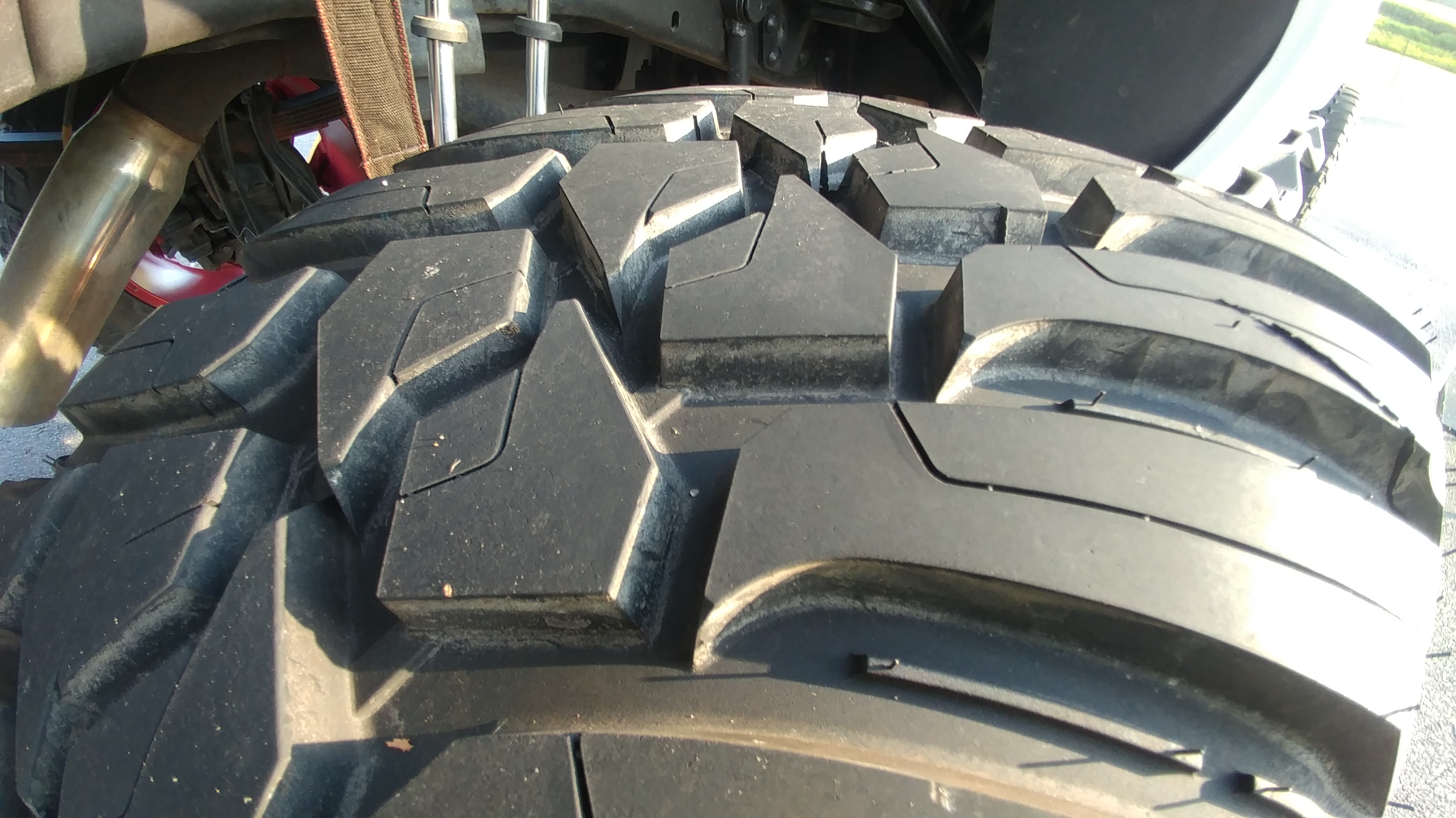 Close up of unworn tread on a 40 inch tire